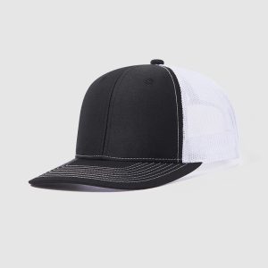 Wholesale blank premium trucker hat featuring a black cotton front, white mesh back, and contrast stitching on the visor.