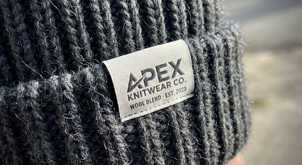 Beanie with center-fold woven label on cuff edge