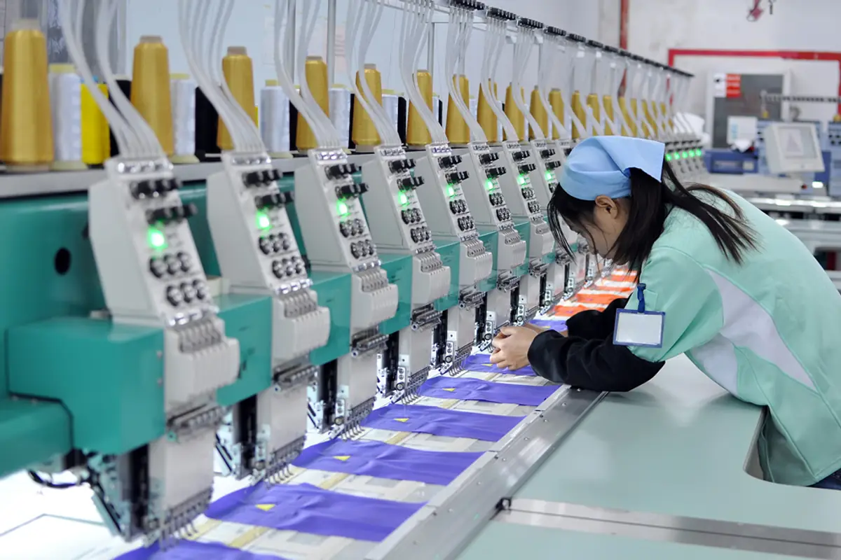 Multi-head embroidery production for custom headwear