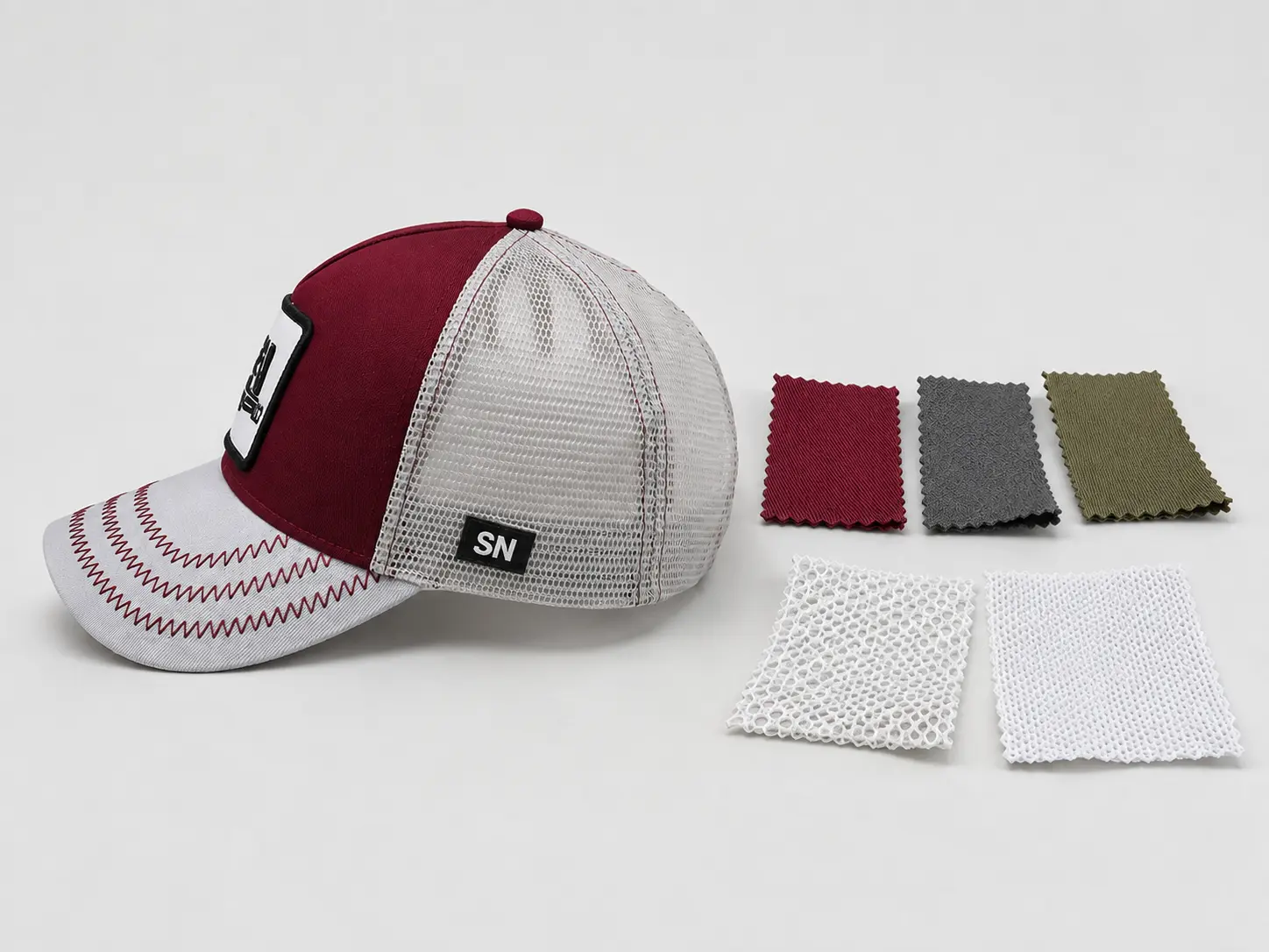 Close-up of trucker hat with different fabric and mesh materials