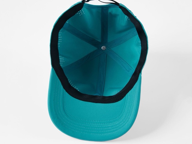 Detail of sweatbands and interior stitching on golf caps