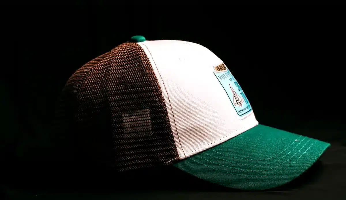 Trucker cap showing a sewn front patch placement