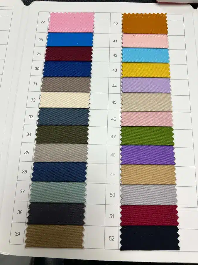 Physical hat fabric color swatch book with multiple woven color options