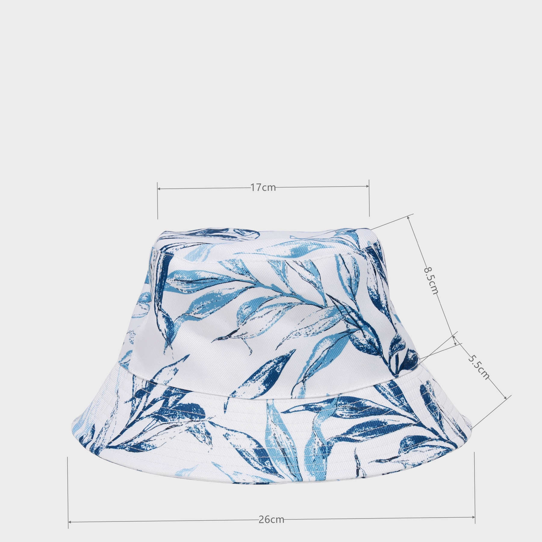 Real printed bucket hat sample with annotated crown-top width, crown height, brim width and outside span